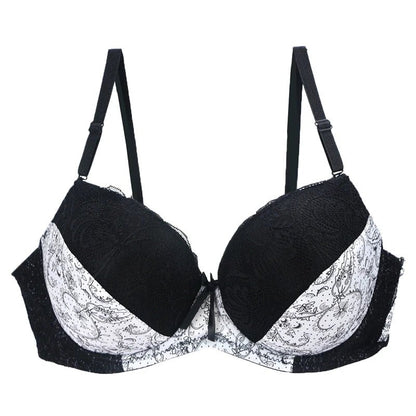 Koronkowy biustonosz push up plus size z pełnymi miseczkami i kontrastowym wzorem - Senséra
